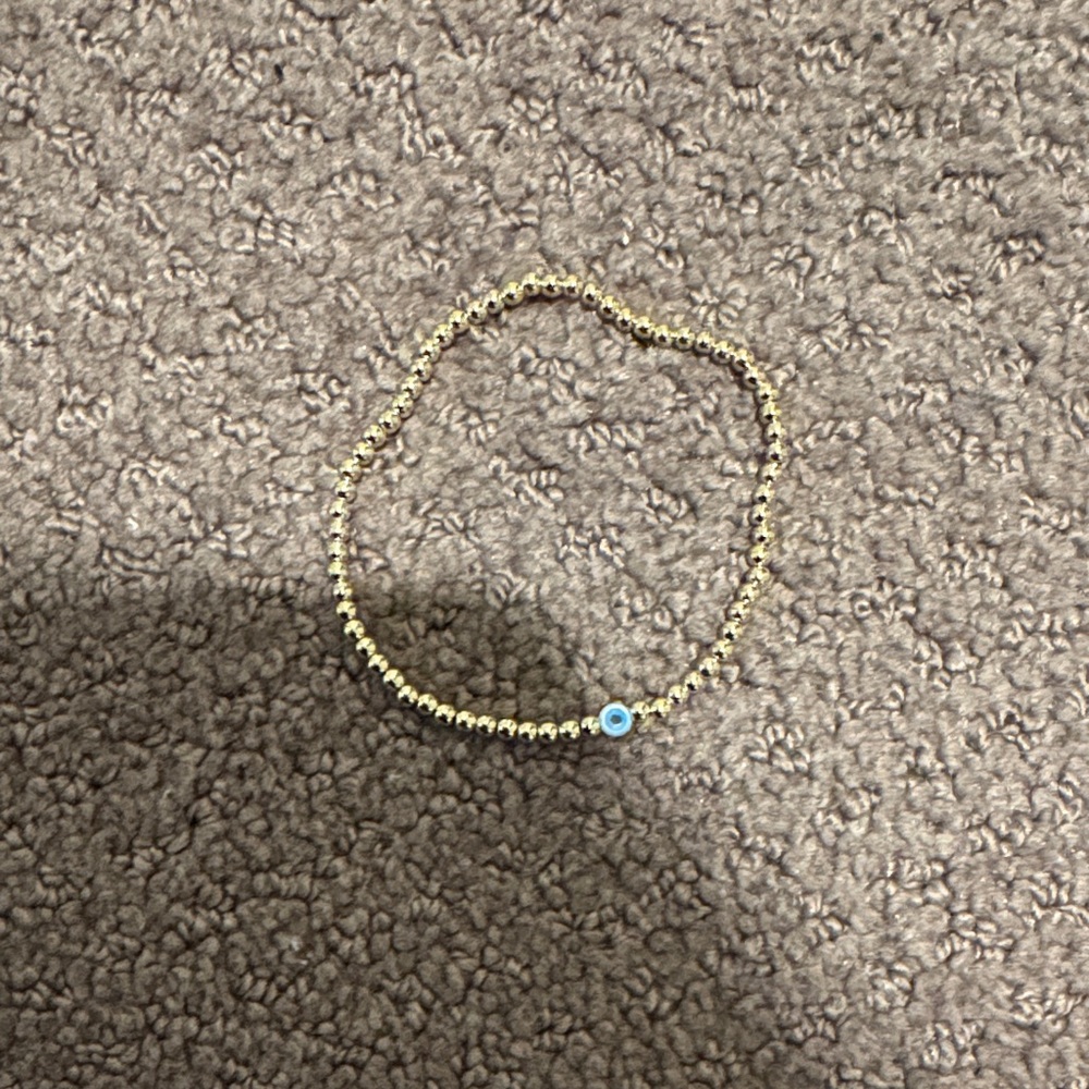 Gold Beaded Bracelet with evil eyes